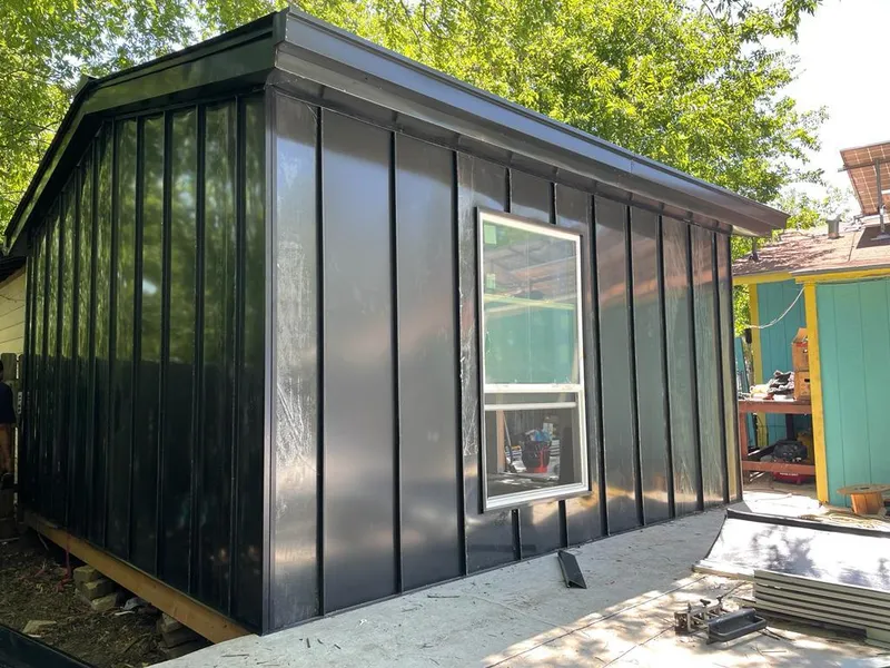 Black standing seam metal wall panels for Metal Roof Installation in Stephenville