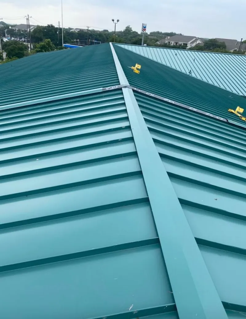 Green commercial metal roof ridge and valley for Metal Roof Repair in Stephenville