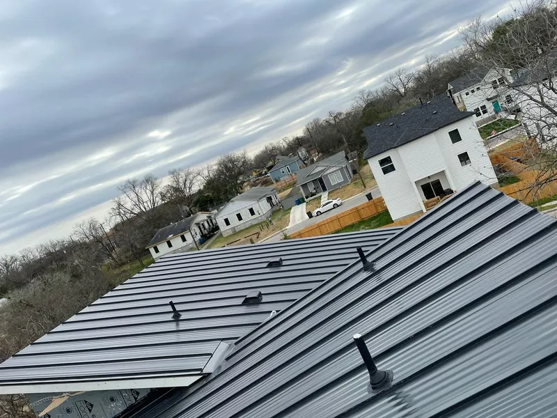 Standing seam metal roof panels with vents for Skylight Repair in Stephenville